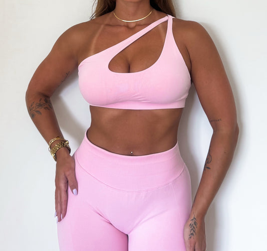 Crossed shoulder sports bra