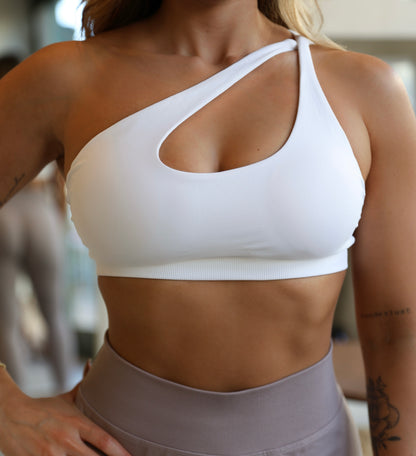 Crossed shoulder sports bra