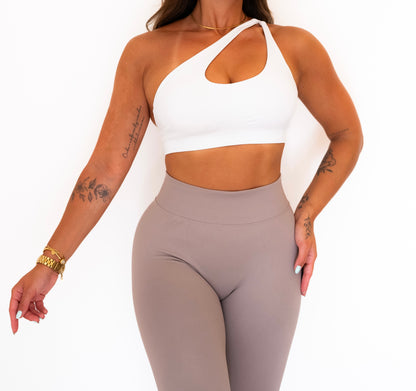 Crossed shoulder sports bra