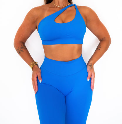 Crossed shoulder sports bra